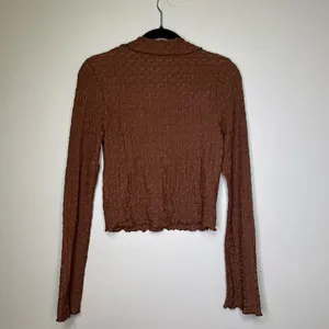Francesca’s brown textured top in M thumbnail 9