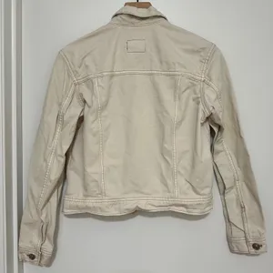 American Eagle | Women's Neutral Cream Denim Short Trucker Jacket, Size XS‎ thumbnail 2