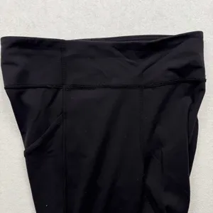 Lululemon Invigorate High-Rise Tight Women’s Size 10 Black Side Pocket Leggings thumbnail 4