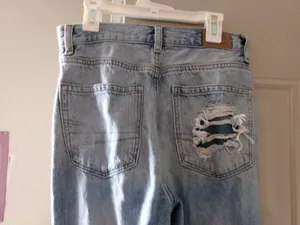 American Eagle Outfitters mom jean ripped distressed denim in light wash blue size 2. thumbnail 6