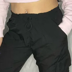 Like New The Chloe Nylon parachute pants by Garage size small in black, sold out thumbnail 11
