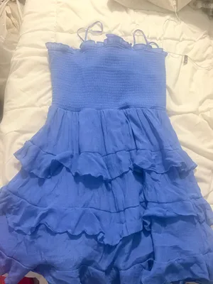 Blue dress from Francesca with tags still on it and an open back thumbnail 1