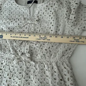 Zesica Womens Beige Eyelet Mini Dress Long Sleeve Bow Front Size M Boho Romantic thumbnail 5