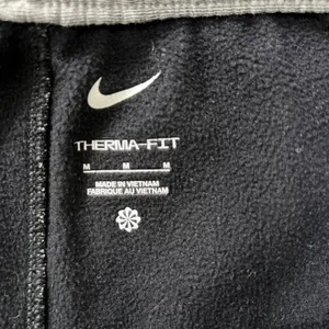 Nike Therma-FIT Showtime Womens Medium Gray Black Basketball Joggers FD1646-032 thumbnail 8