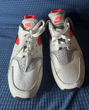 Nike Air Hurrache White Sneakers with Bright Red Accents thumbnail 1