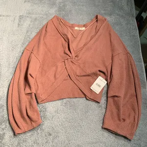 NWT free people we the free Wrap Top twist front cactus tint large MSRP$78 thumbnail 1