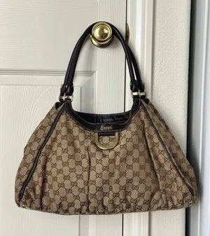 Gucci Abbey D-Ring GG Canvas Shoulder Bag thumbnail 1