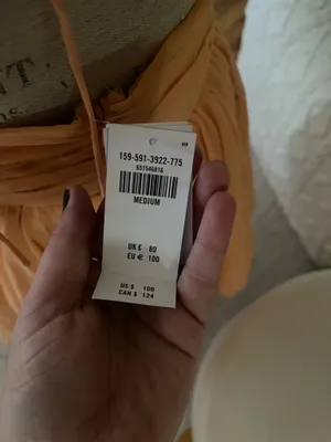 This orange Abercrombie & Fitch mini dress features a deep V-neckline, a ruched waistband, and a flared chiffon skirt thumbnail 6