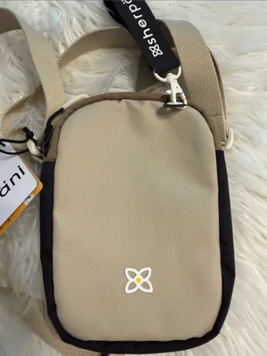 Sherpani Beige and Black Compact Crossbody Pouch brand new thumbnail 2