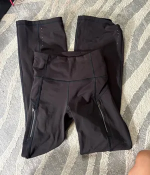 Athleta black high rise rainier bootcut yoga pants thumbnail 1