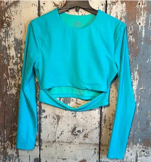 Jolyn Taranaki Long Sleeve Crop Cut-out Rashguard Teal, size Large thumbnail 1