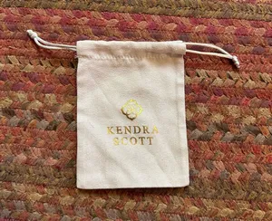 Kendra Scott Cream Drawstring Jewelry Pouch with Gold Logo thumbnail 1