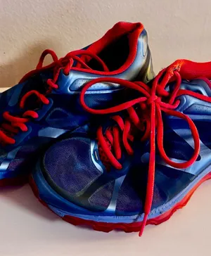 Vintage Nike Air Blue Sneakers with Red Accents thumbnail 1