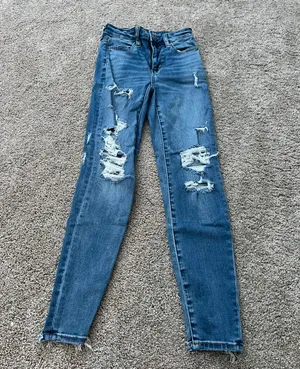 American Eagle Next Level Stretch Ripped Jeans thumbnail 1