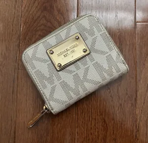Michael Kors leather monogrammed mini zip around wallet thumbnail 1