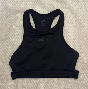 Nike Dri-FIT High Neck Sports Bra thumbnail 1