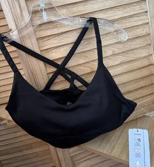 RBX Black Strappy Sports Bra with Crisscross Back Medium NWT thumbnail 1