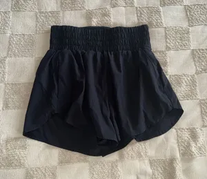 HALARA Black Athletic Flow Shorts High Smocked Waist Layered Size M NWOT thumbnail 1