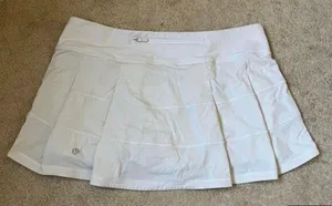 White Lululemon pace rival skirt with built in shorts thumbnail 1