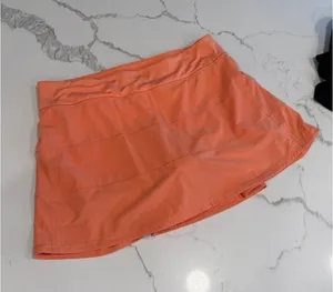Lululemon Pace Rival Mid-Rise Skirt orange color 10 nwot thumbnail 1