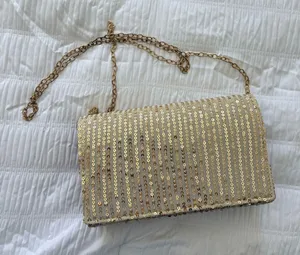 Sequin sparkly clutch with a detachable long chain and a sparkly gold finish thumbnail 1