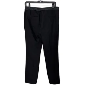 ZARA BASIC Collection Black trousers zip hem Back stripe straight leg size Lg The ZARA BASIC Collection Black trousers are stylish dress pants in size L with a zip hem feature and back stripe accents. Made from a fabric blend of blended polyester, these pants have a straight leg style and pockets for added convenience. Perfect for casual occasions in the summer, fall, and spring, these trousers are machine washable for easy care. The black pants with stripes offer a city-inspired theme, making them a versatile and chic addition to any woman's wardrobe. thumbnail 3