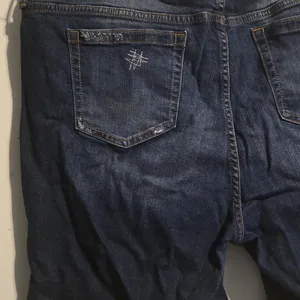 torrid Dark to Medium Wash Distressed Denim Bermuda Shorts thumbnail 9