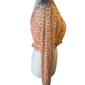 Orange and white geometric patterned Size M thumbnail 4