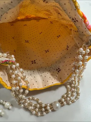 Yellow Floral Embroidered Indian potli Bag thumbnail 4