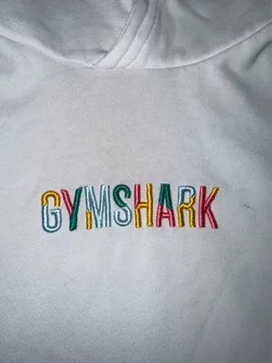 Gymshark Embroidered Logo Pullover Hoodie in White with Multicolored Text thumbnail 2