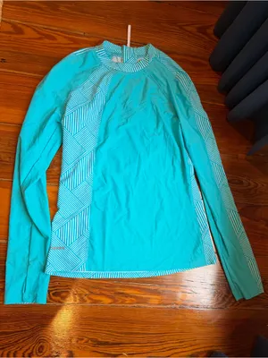 Mott50 Women’s Long Sleeve Aqua Rash Guard Top thumbnail 1