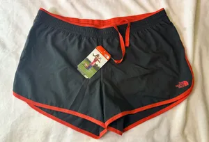 The North Face Women's Black Shorts with Red Trim thumbnail 1
