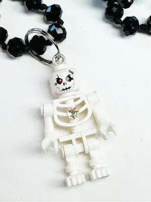 Lego Skeleton Charm on a long 36” Black Beaded Necklace. thumbnail 1