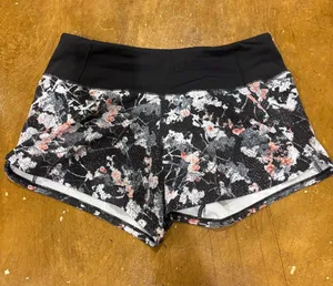 lululemon athletica Black Floral Print Athletic Shorts with Pink Accents thumbnail 1