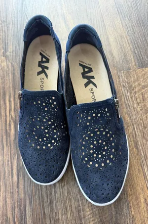 Anne Klein Navy Laser-Cut Slip-On Sport Sneakers thumbnail 1