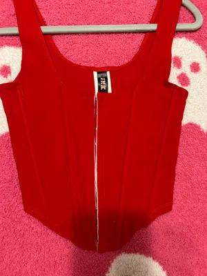 Mystique Boutique Stylish red sleeveless top with a front zipper. Perfect for casual outings. thumbnail 2