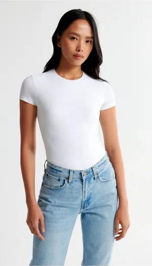 Abercrombie & Fitch Seamless Short Sleeve Bodysuit in White thumbnail 1