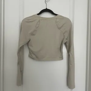 Alphalete Cream Long Sleeve Crop Top thumbnail 2