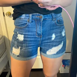 High waisted denim shorts with distressing thumbnail 1