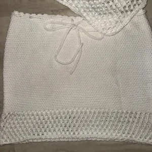 White crochet mini skirt set with textured openwork pattern from Amazon, size S thumbnail 3
