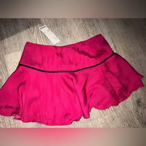 Urban Outfitters Pink mini skirt with black ribbon detail thumbnail 7