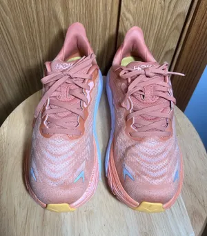 Hoka Women's Coral/Yellow Athletic Running Shoes thumbnail 1