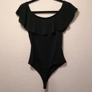 NWT. Very cute and sexy body suit. Iris brand. thumbnail 6