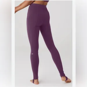 Alo Yoga Airlift Suit Up Stirrup Leggings in a gorgeous plum purple shade thumbnail 2