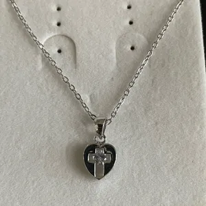 Silver heart and cross necklace thumbnail 1