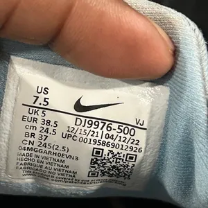 Nike React Sneakers in Black, White, and Orange Running shoes thumbnail 6
