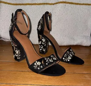 Mari A black floral heels feature a high block heel thumbnail 1