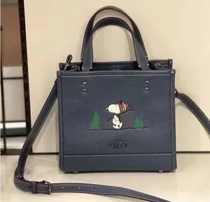 Coach X Peanuts Dempsey Tote 22 With Snoopy Ski Motif ce849 thumbnail 1
