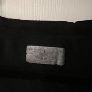 Classic Black V-Neck Women's Top thumbnail 2
