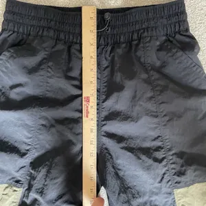 Nike Women's City Utility Zip Cuff Track Pants Athletic Black Green Size Medium thumbnail 13